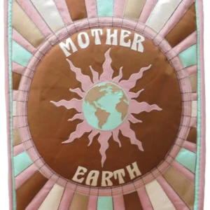 Hand-stitched "Mother Earth" quilt art. Featuring a globe surrounded by the words "Mother Earth" and a sun-like design