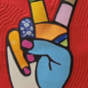 pop art style sign of peace with two fingers raised from a clenched fist