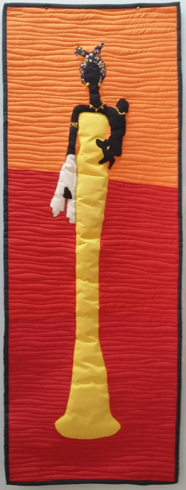 Art quilt depicting a woman in a yellow dress with a child on her hip.